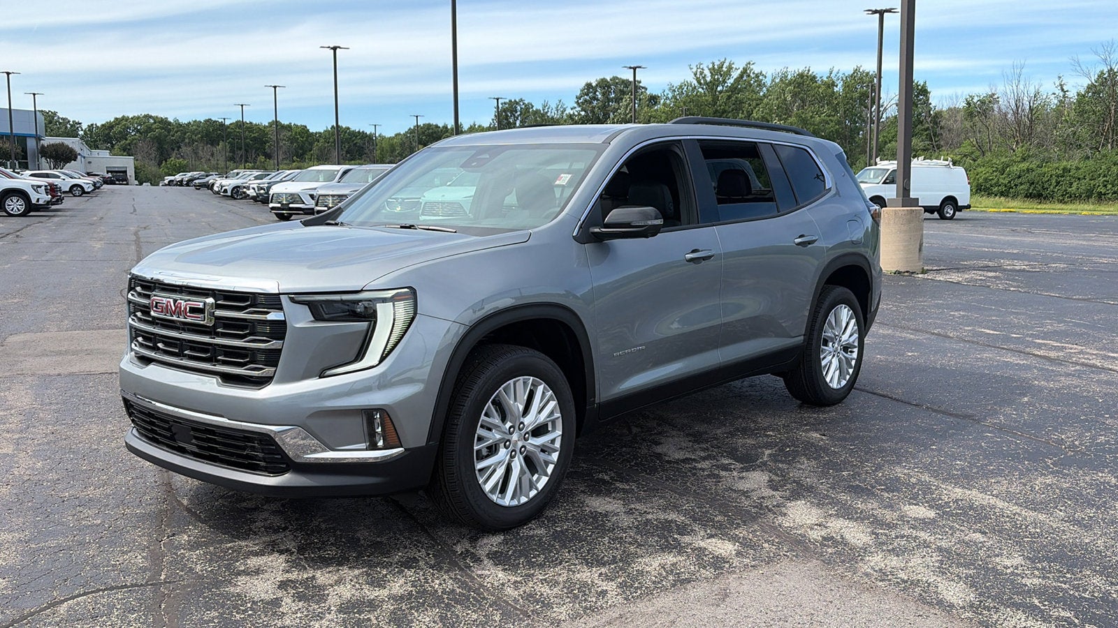 2026 GMC Acadia Elevation in Sterling Metallic — front three-quarter view