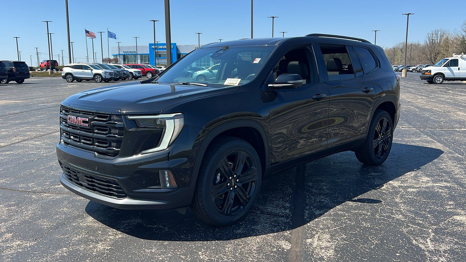 2026 GMC Acadia Elevation in Ebony Twilight Metallic — front three-quarter view
