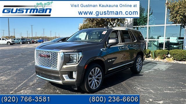 2021 GMC Yukon Denali in Smokey Quartz Metallic — front three-quarter view