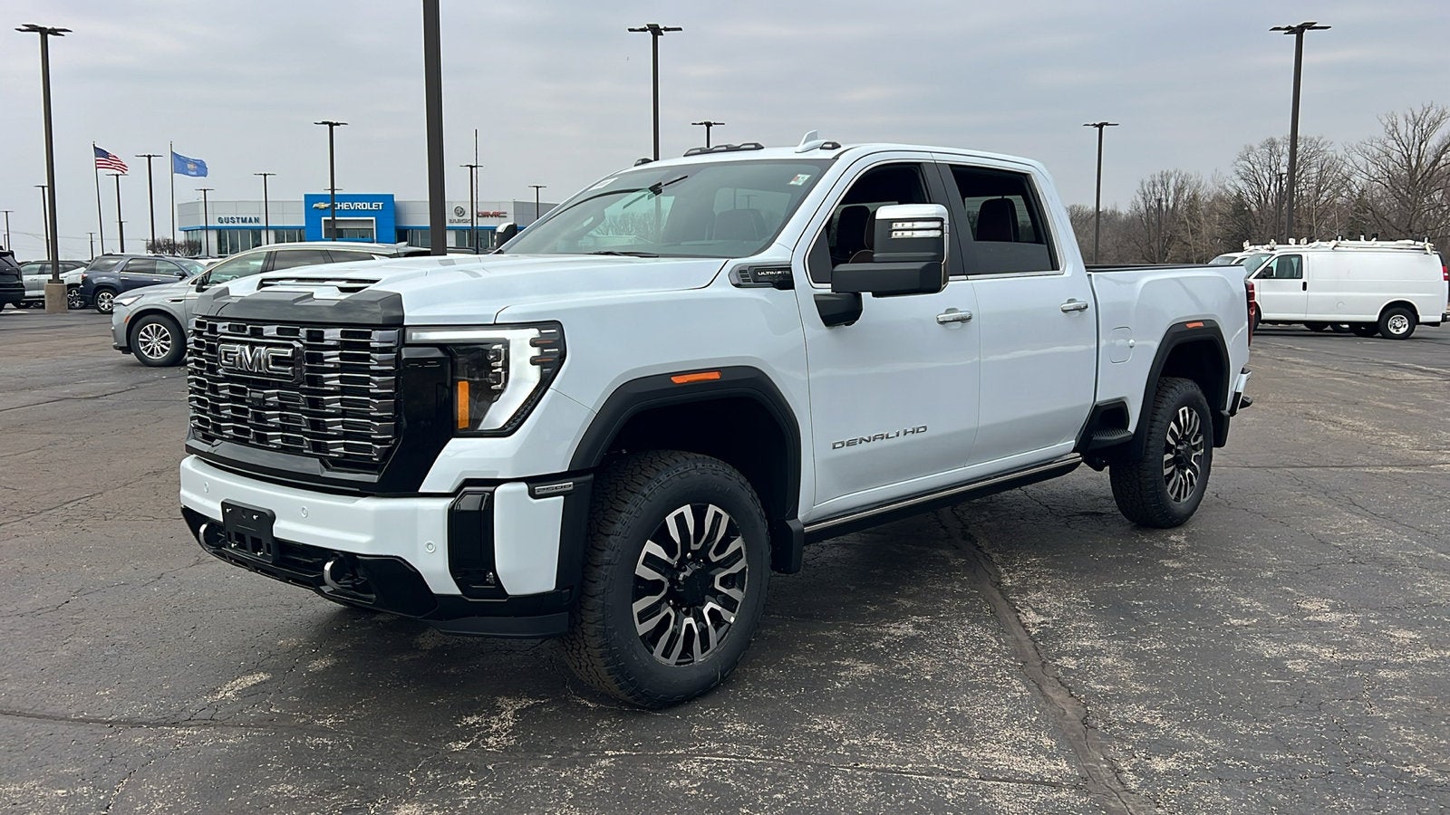 2026 GMC Sierra 2500 HD Denali Ultimate in Glacier White Tricoat — front three-quarter view