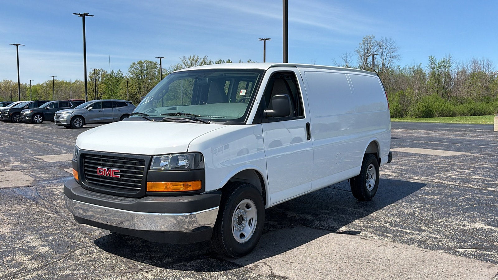 2026 GMC Savana Cargo Work Van in Summit White — front three-quarter view
