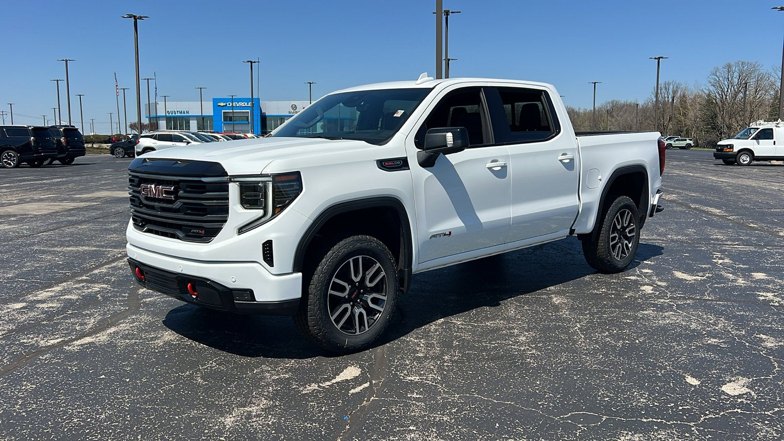 2026 GMC Sierra 1500 AT4 in Summit White — front three-quarter view