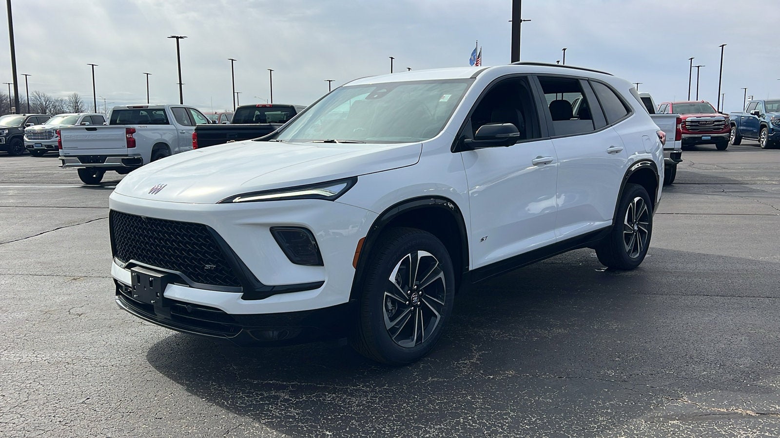 2026 Buick Enclave Sport Touring in Summit White — front three-quarter view