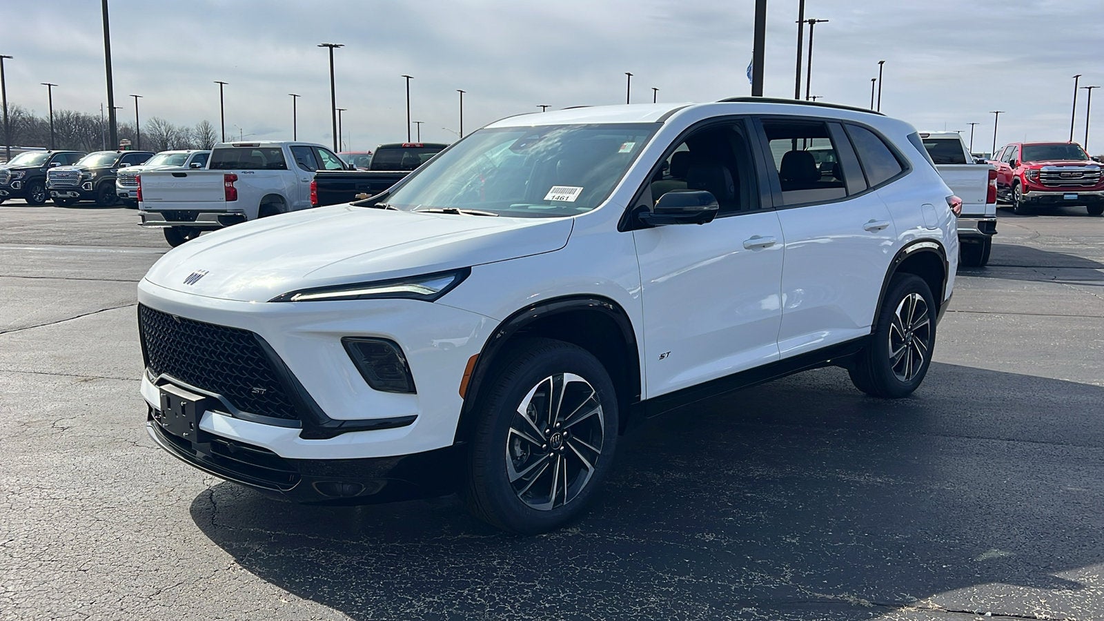 2026 Buick Enclave Sport Touring in Summit White — front three-quarter view
