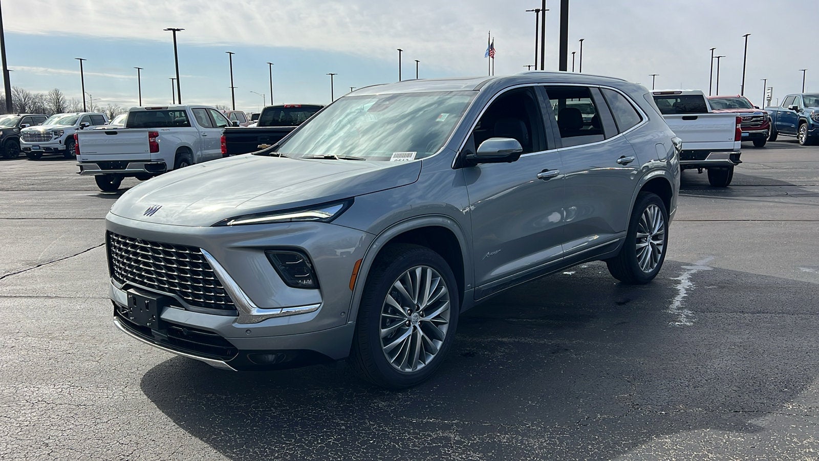 2026 Buick Enclave Avenir in Moonstone Gray Metallic — front three-quarter view