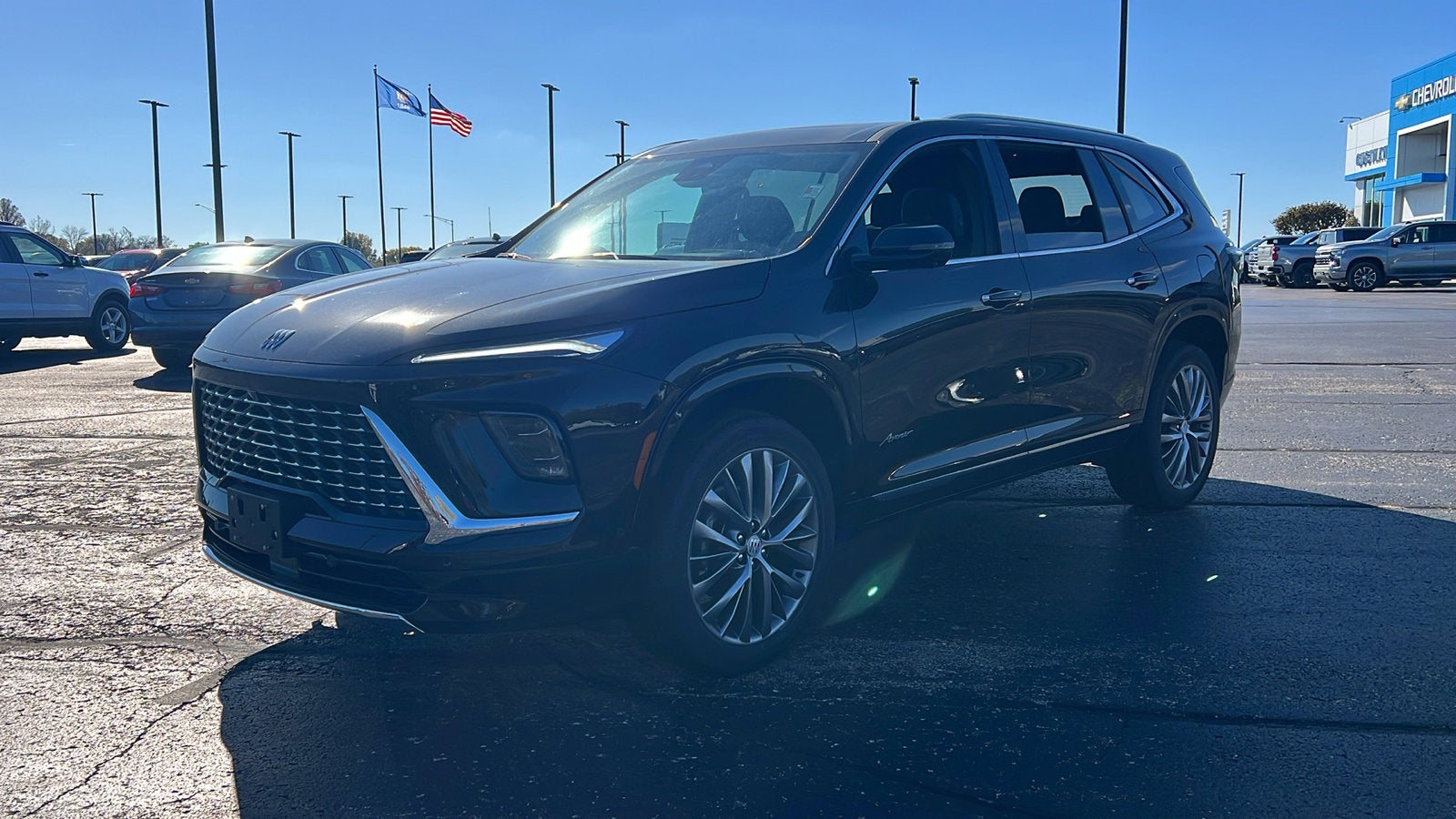 2026 Buick Enclave Avenir in Ebony Twilight Metallic — front three-quarter view