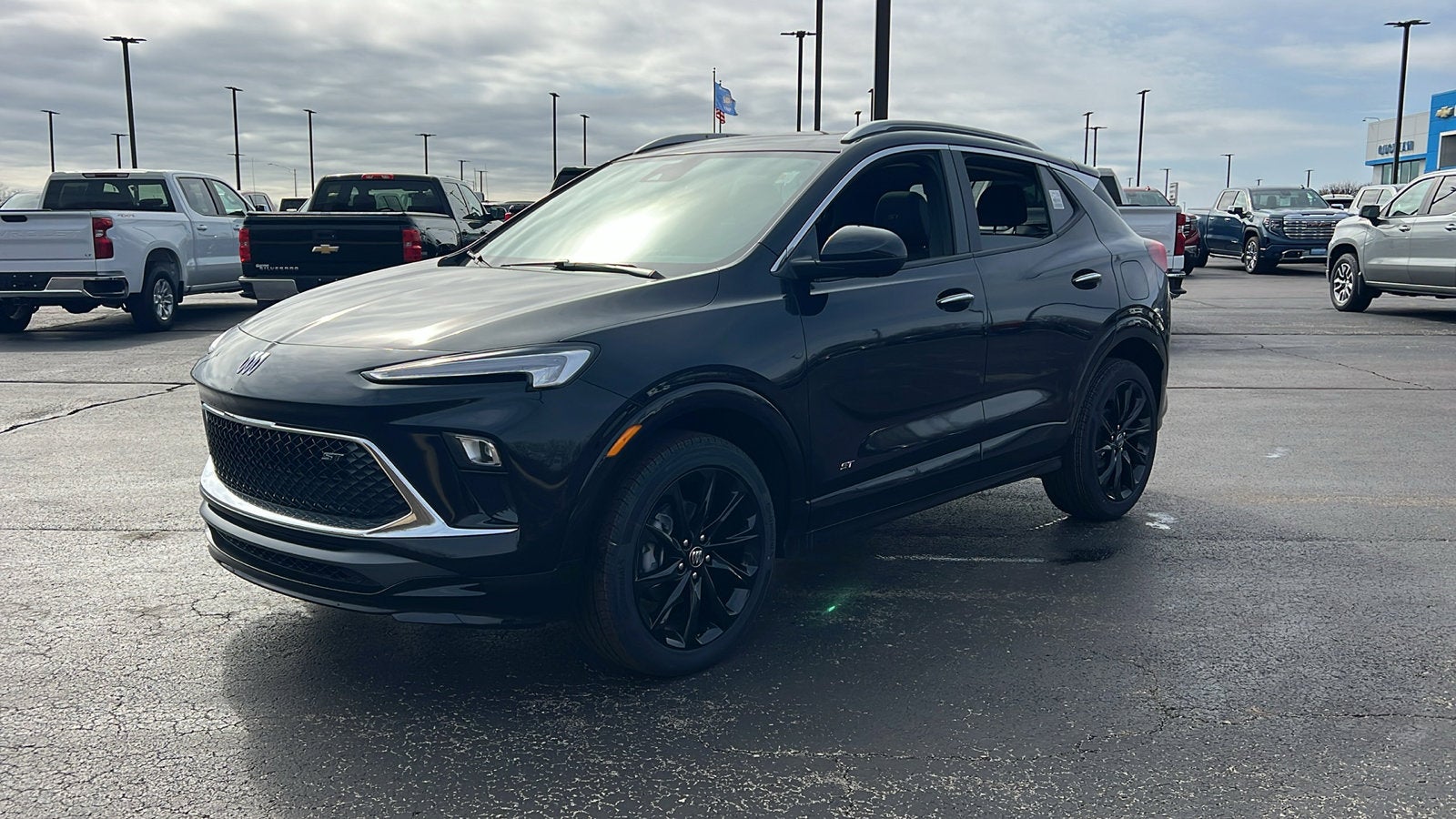 2026 Buick Encore GX Sport Touring in Ebony Twilight Metallic — front three-quarter view