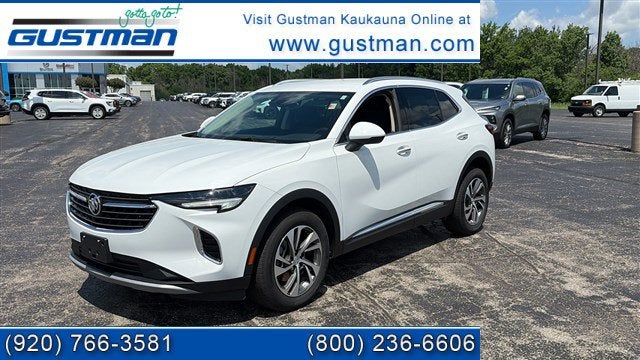 2023 Buick Envision Essence in Summit White — front three-quarter view