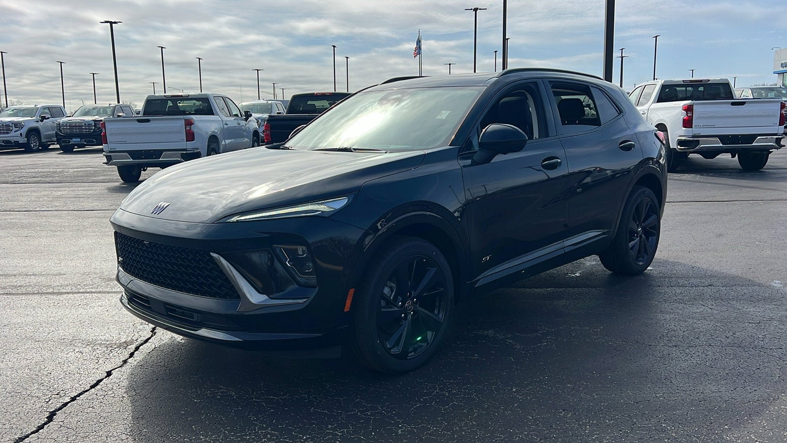 2026 Buick Envision Sport Touring in Ebony Twilight Metallic — front three-quarter view