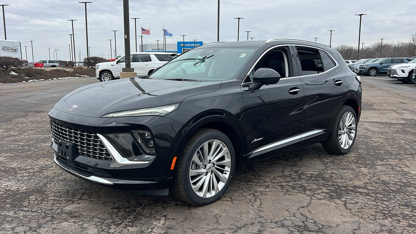 2026 Buick Envision Avenir in Ebony Twilight Metallic — front three-quarter view
