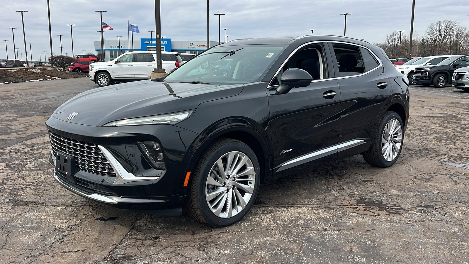 2026 Buick Envision Avenir in Ebony Twilight Metallic — front three-quarter view