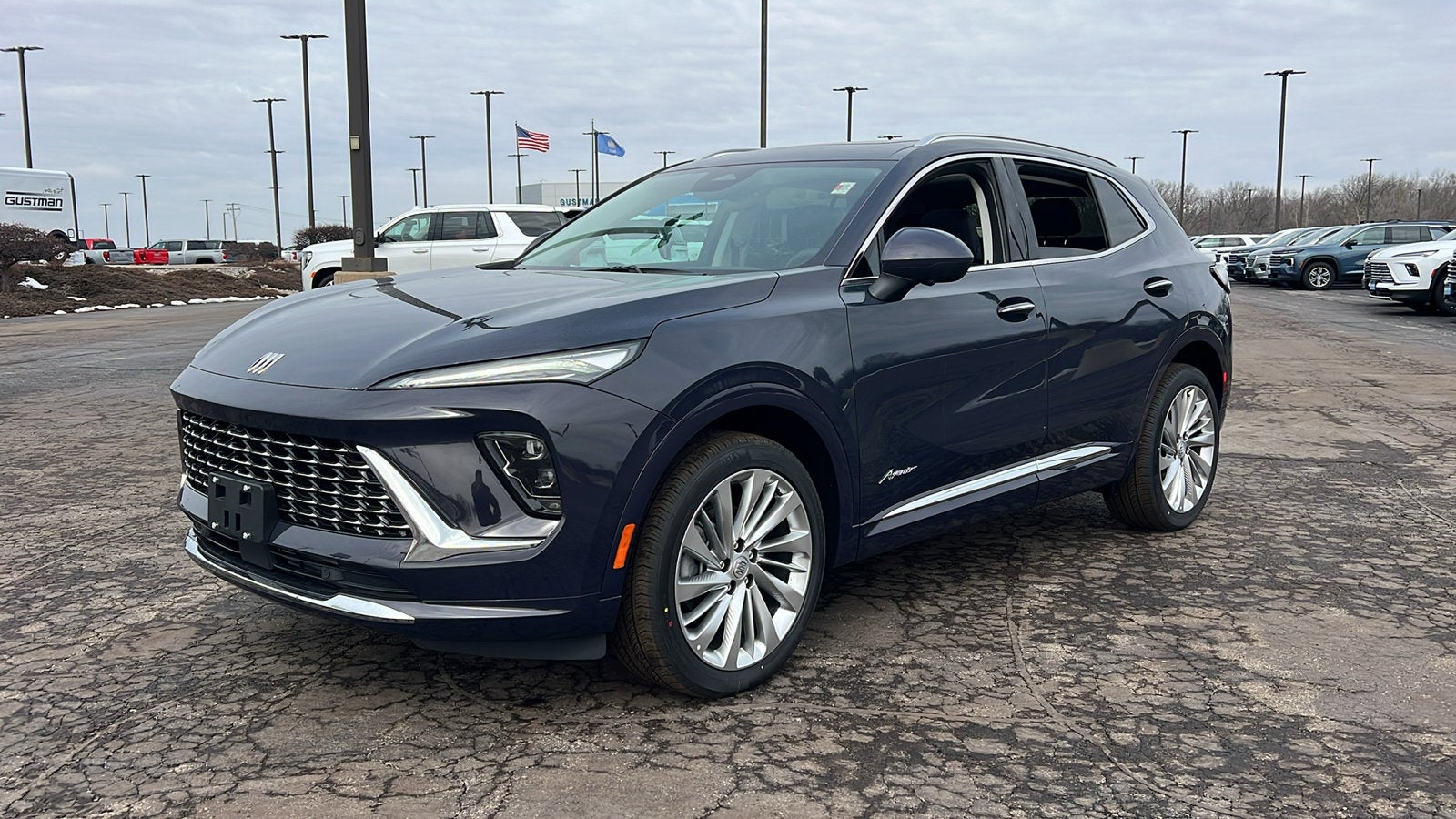 2026 Buick Envision Avenir in Midnight Opal — front three-quarter view