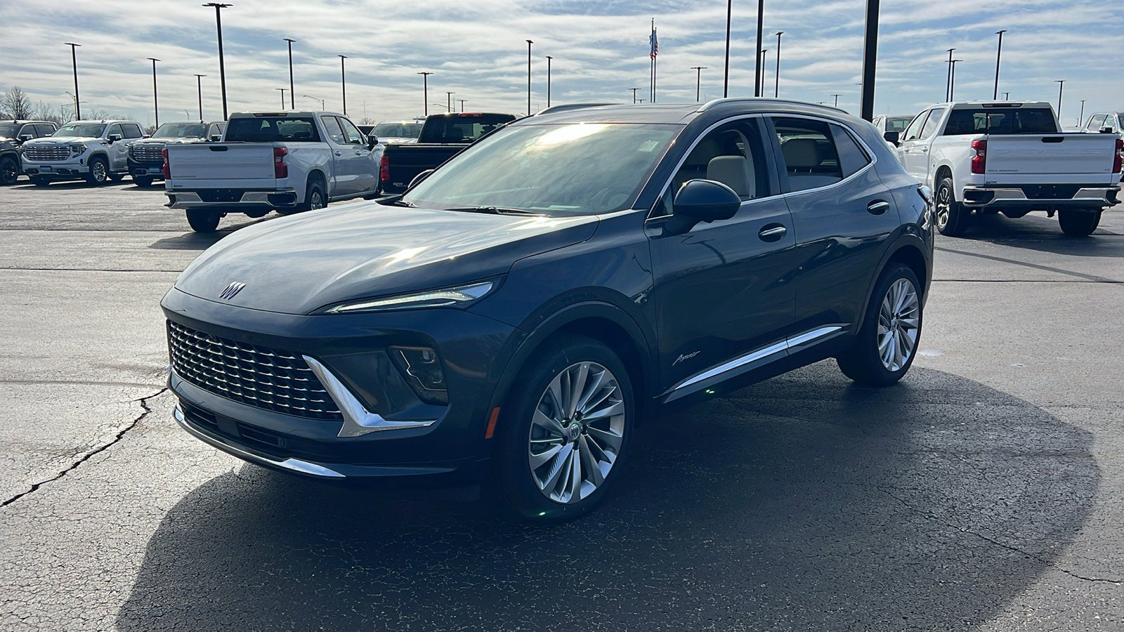 2026 Buick Envision Avenir in Quartz Blue Metallic — front three-quarter view