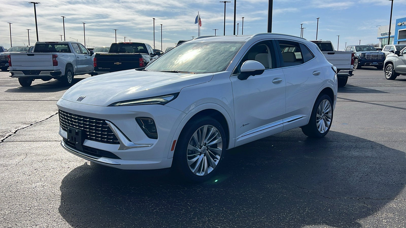 2026 Buick Envision Avenir in Iridescent White Tricoat — front three-quarter view